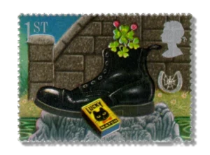 Four-leaf clover in boot and match box