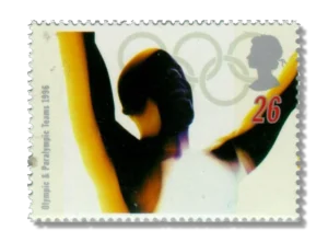 Athlete celebrating and Olympic Rings